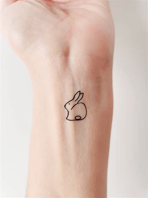 bunny tattoo|minimalist bunny tattoo.